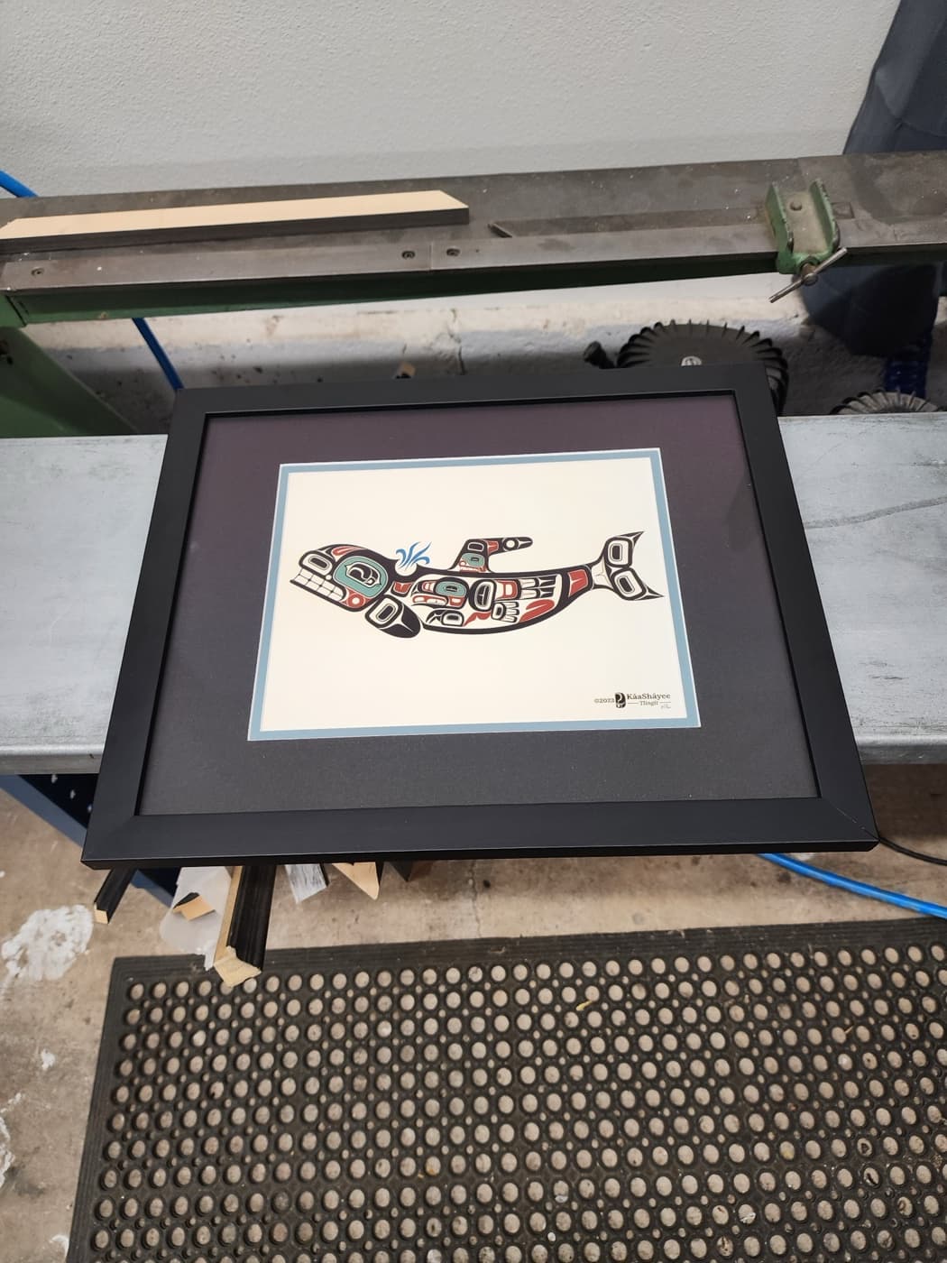 Signed limited-edition Coast Salish fine art print, conservation matted and framed by Redhawk Framing Studio